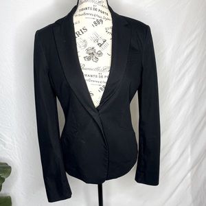 Black blazer with ruffle back